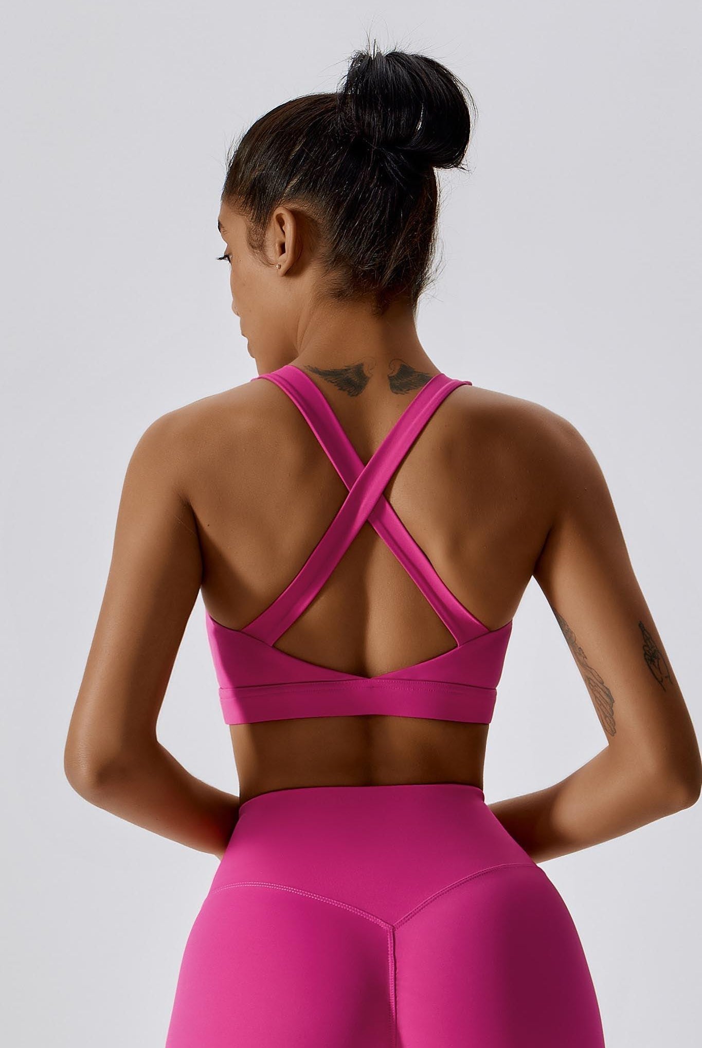 Stylish Magenta Sports Bra with Supportive Cross-Back Design by BOTA Official