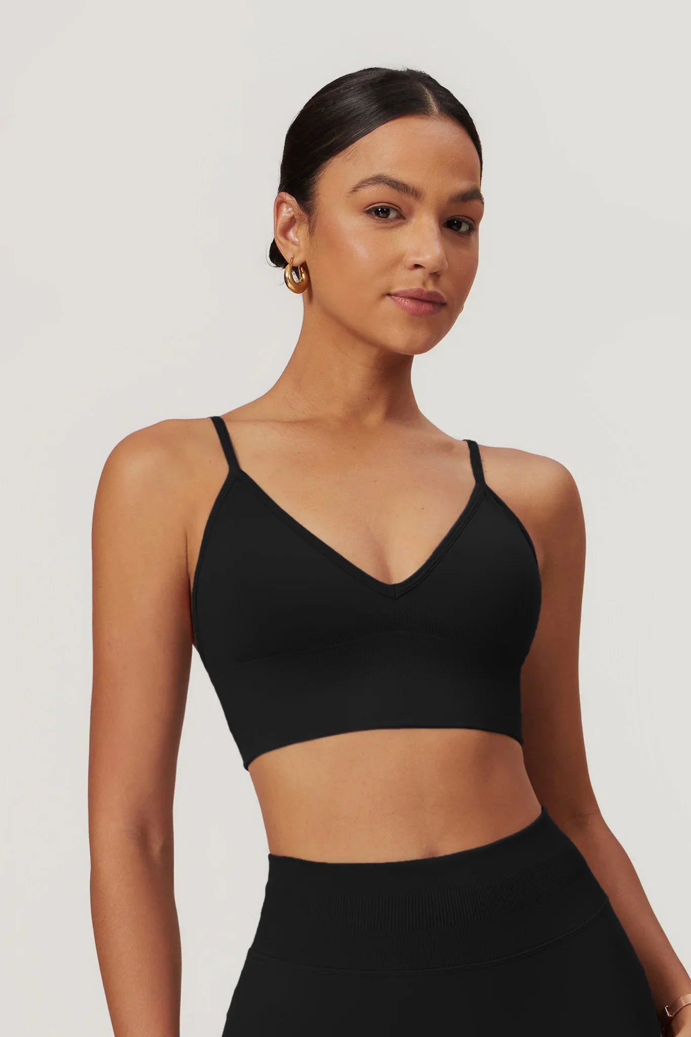 Chic Black Sports Bra with Adjustable Straps and V Neckline by BOTA Official