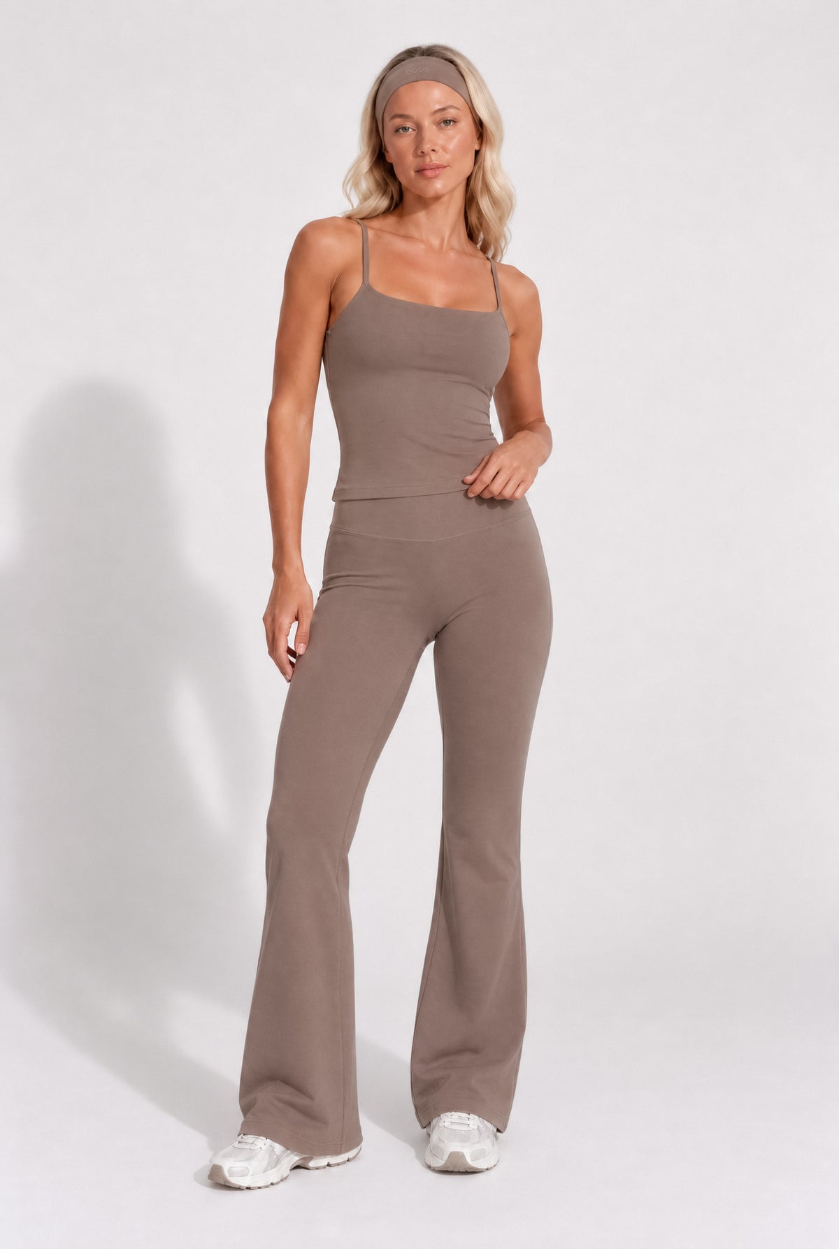 Truffle brown organic cotton flare leggings and cami top, full-length view.