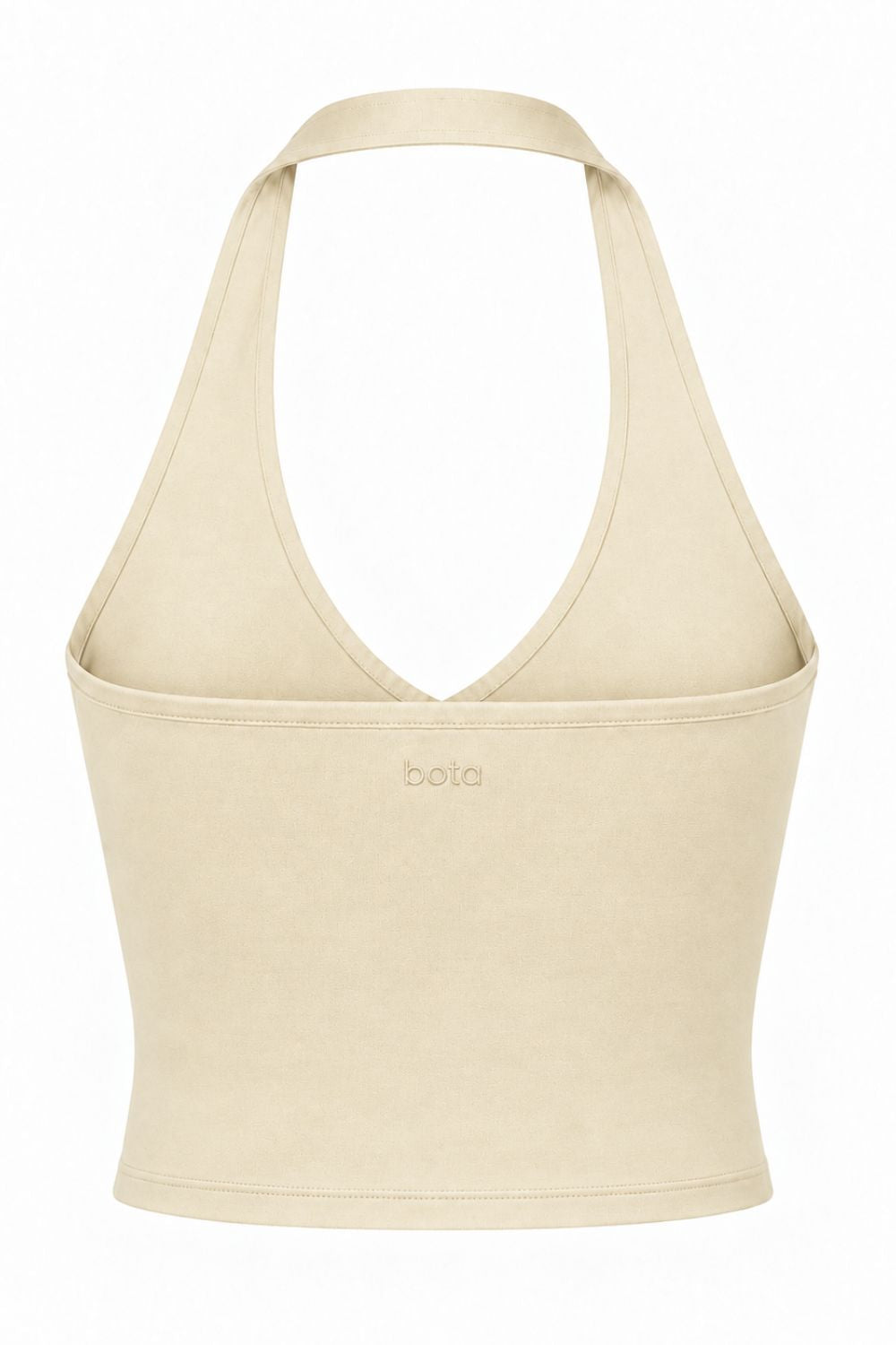 Buttercream organic cotton halter top with a halter neckline and open back.