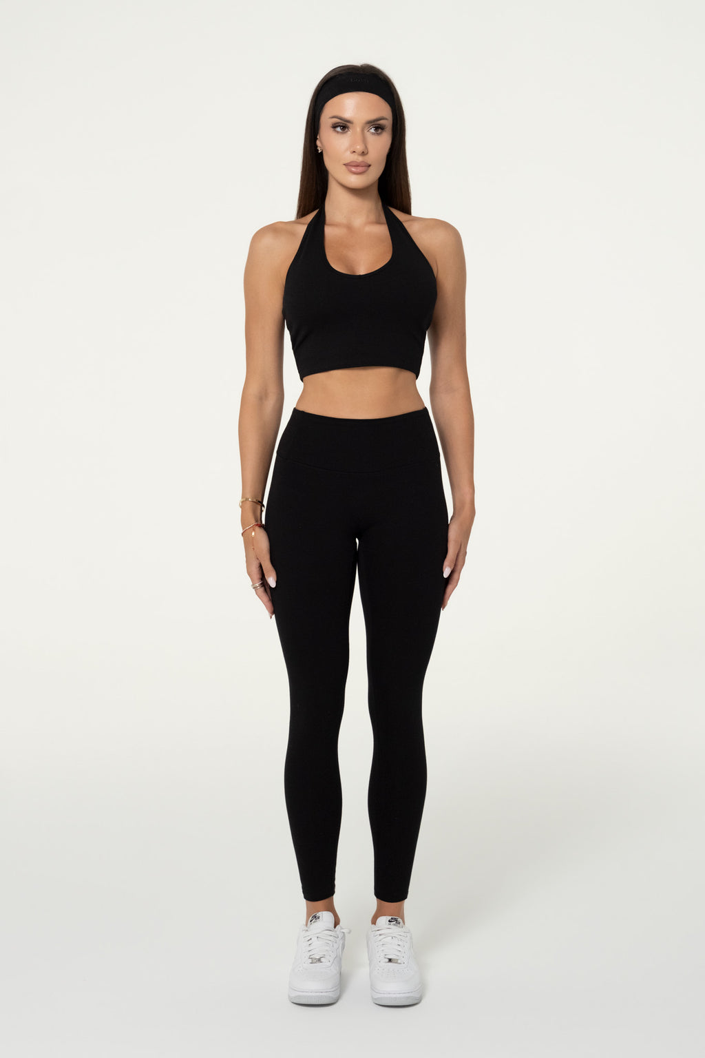 Front view of black organic cotton high-waisted leggings.