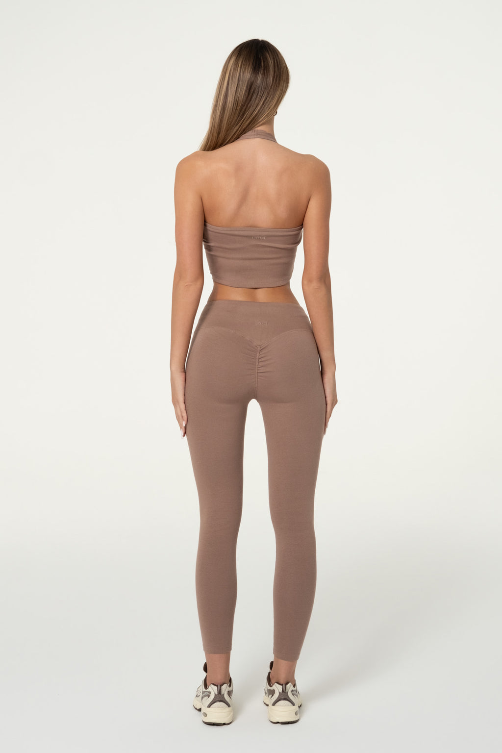 Truffle brown organic cotton halter top showing the fitted silhouette.