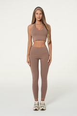 Front view of a truffle brown organic cotton halter top, cropped and fitted.