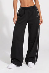 Front view of black organic cotton oversized wide-leg sweatpant.