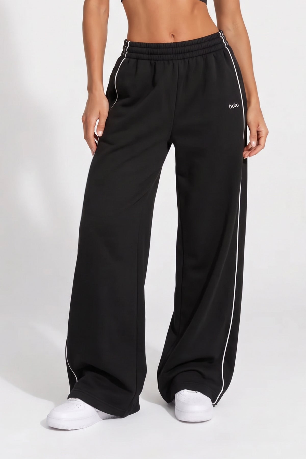 Front view of black organic cotton oversized wide-leg sweatpant.