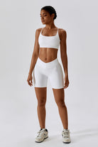 Sleek White Sports Bra with Thin Strap and Scoop Neckline By BOTA Official